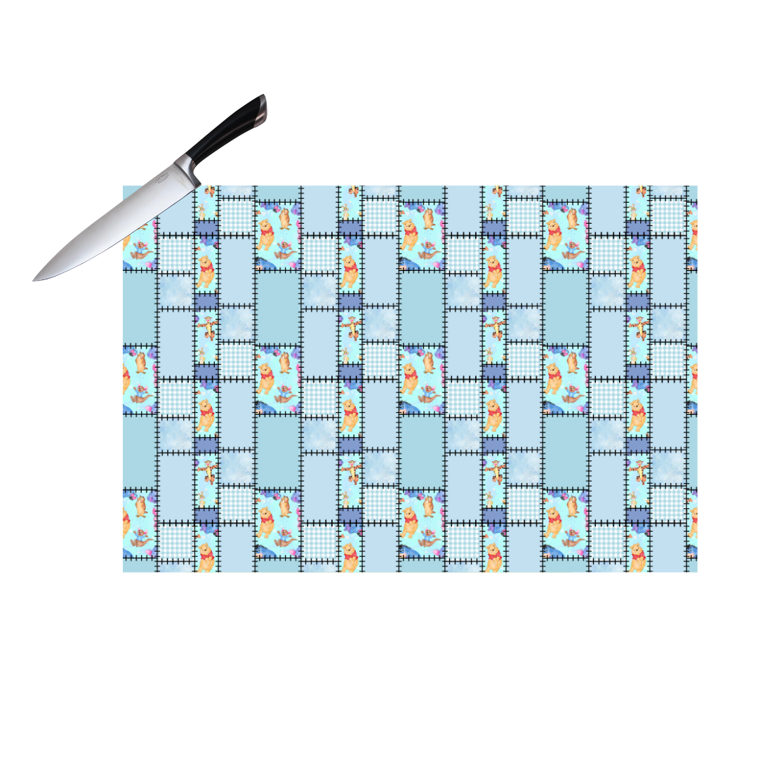 POOH BLUE PLAID CUTTING BOARD